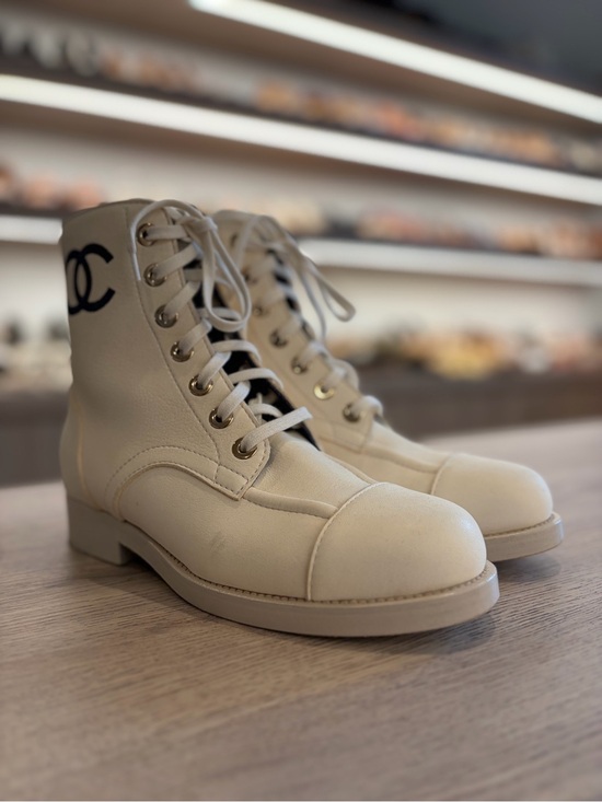 CHANEL Shoes - CHANEL Cream Leather Lace-Up Combat Boots with Navy CC